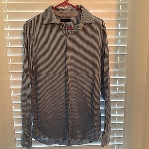 Button up collared blue and white striped shirt